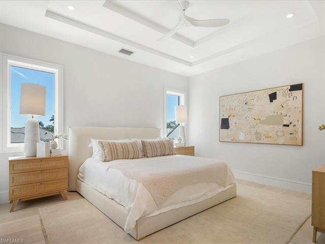 Bedroom featuring visible vents, baseboards, ceiling fan, recessed lighting, and a raised ceiling