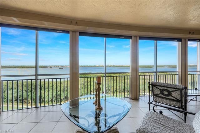 The spacious screened lanai spans from the living room area to the main bedroom.  Electric storm shutters add protection and convenience.