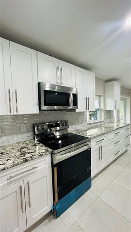 BLUE PORCELEIN OVEN AND RANGE & MICROWAVE