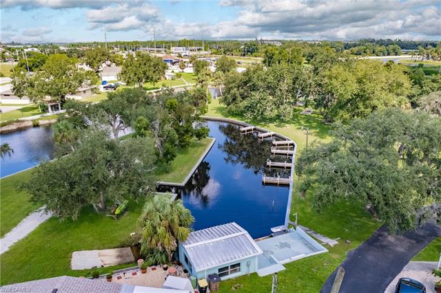 Aerial view of community dockhouse and marina
