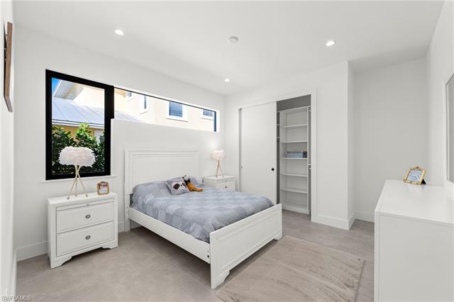 Bedroom with recessed lighting, a closet, and baseboards