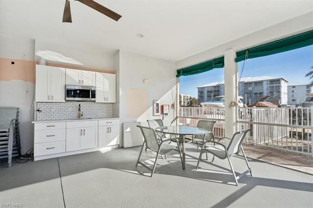 Cabana with kitchen, sitting area and restrooms