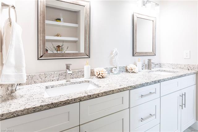 Bathroom with vanity and built in features