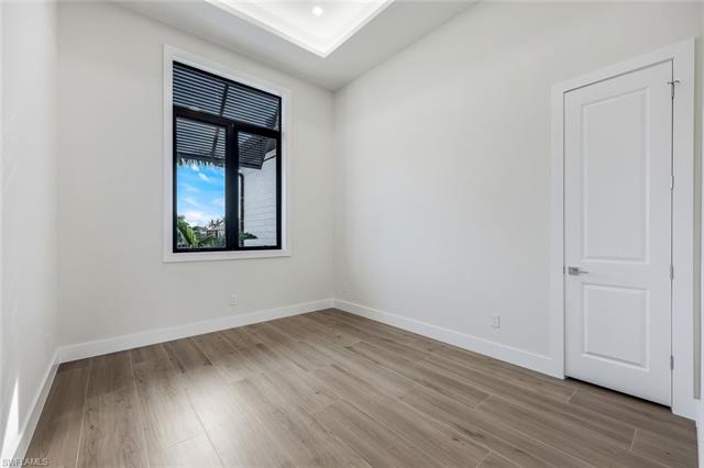 Empty room featuring light wood-type flooring