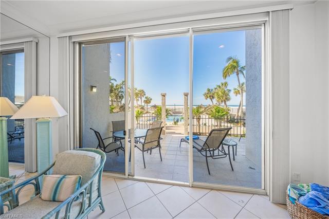 Entryway from pool area, so one has a beachside entrance and two additional entrances to the lobby dedicated to the two beachfront residences #101 and #102