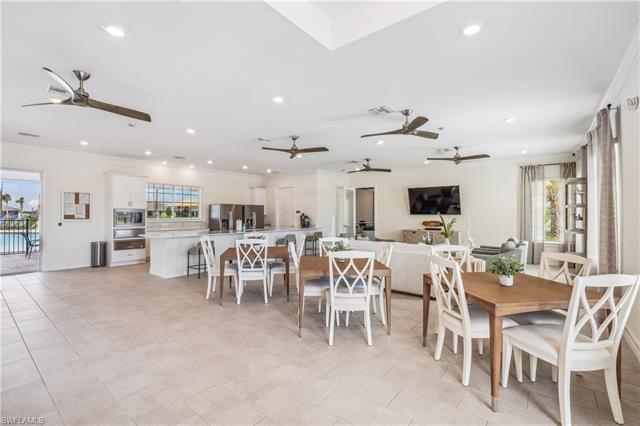 Dining room with light tile patterned floors