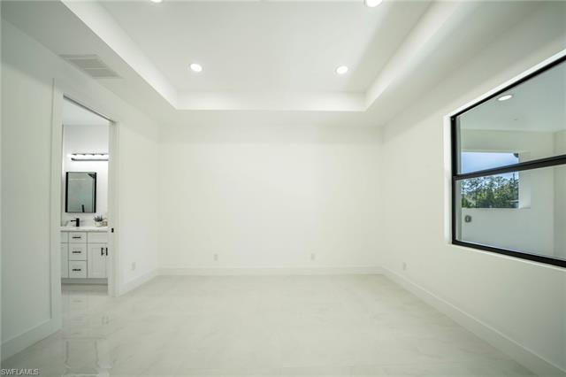 Unfurnished bedroom with visible vents, recessed lighting, and baseboards