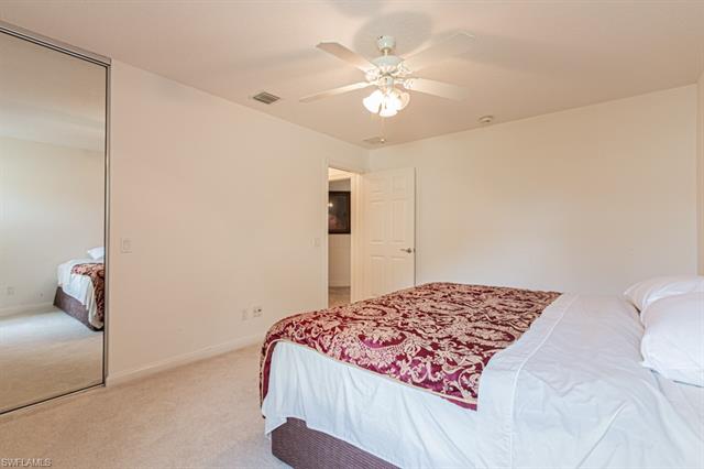 Bedroom featuring a custom closet