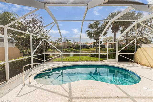 Outdoor pool with a patio area and a lanai