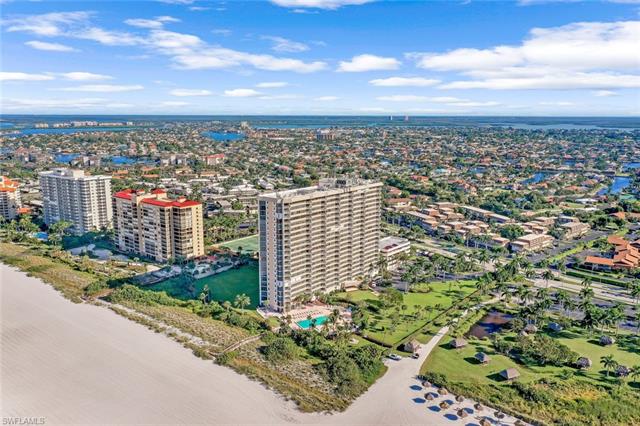 Birds eye view of property featuring a city view and a water view
