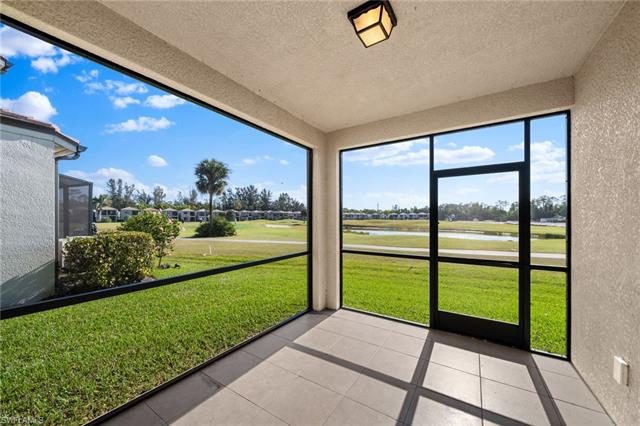 Unfurnished sunroom with a water view