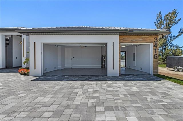 Garage with decorative driveway