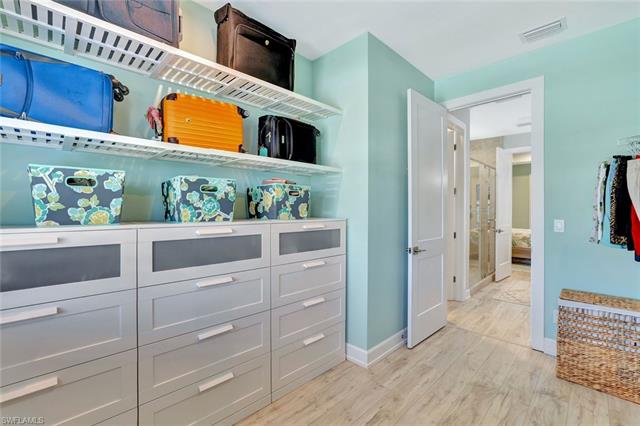 Spacious closet featuring visible vents and light wood-style flooring