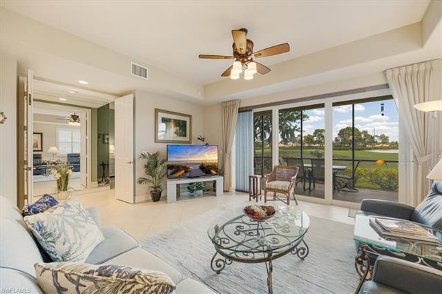 Living room with light tile patterned floors, visible vents, recessed lighting, and a ceiling fan