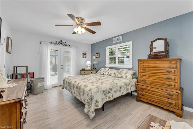 Spacious primary bedroom with a relaxing atmosphere.